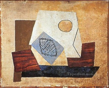 パブロ・ピカソ Painting - タバコの箱の中の静物画 1921 年キュビスト パブロ・ピカソ